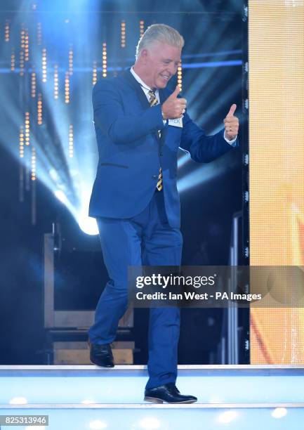 Derek Acorah enters the Celebrity Big Brother house at Elstree Studios in Borehamwood, Herfordshire.