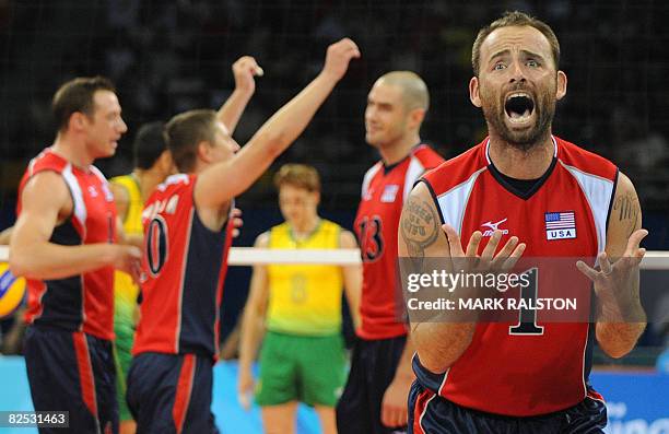 Player Lloy Ball celebrates a point against Brazil during the men's volleyball gold medal match in the 2008 Beijing Olympic Games in Beijing on...