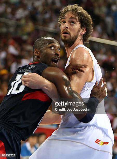 Kobe Bryant of the United States and Pau Gasol of Spain battle for position in the gold medal game during Day 16 of the Beijing 2008 Olympic Games at...