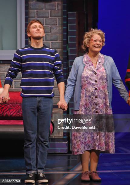 Cast members Ashley Cousins and Gilly Tompkins bow at the curtain call during the press night performance of "David Walliams' Gangsta Granny" at The...