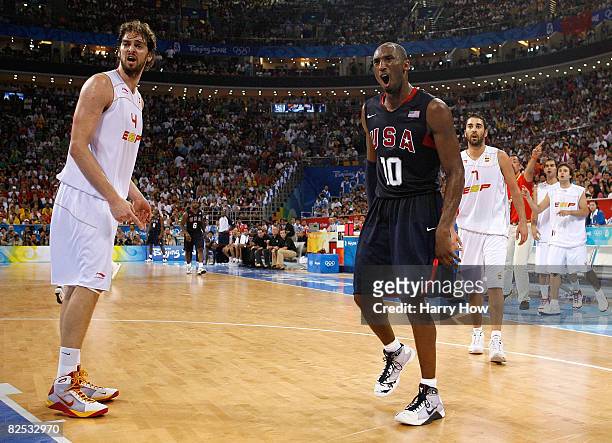 Kobe Bryant of the United States reacts to a call as Pau Gasol of Spain looks back in the gold medal game during Day 16 of the Beijing 2008 Olympic...