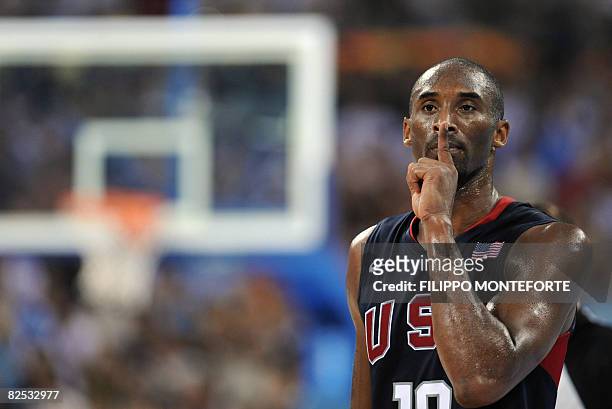 S Kobe Bryant gestures after scoring during their men's basketball gold medal match Spain against The US of the Beijing 2008 Olympic Games on August...