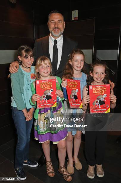 David Walliams poses with young fans at the press night after party for "David Walliams' Gangsta Granny" at The Mint Leaf on August 1, 2017 in...