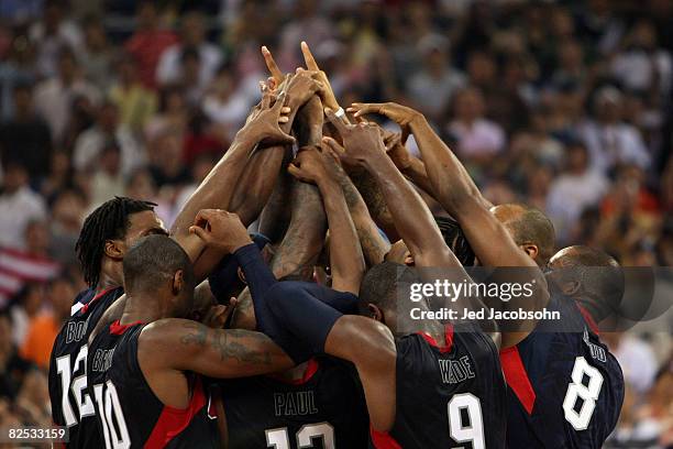 The United States team huddles at center court after defeating Spain 118-107 in the gold medal game during Day 16 of the Beijing 2008 Olympic Games...