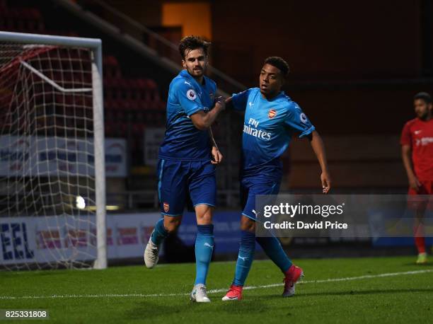 Carl Jenkinson celebrates scoring Arsenal's 4th goal during the match between Leyton Orient and Arsenal U23 at Brisbane Road on August 1, 2017 in...