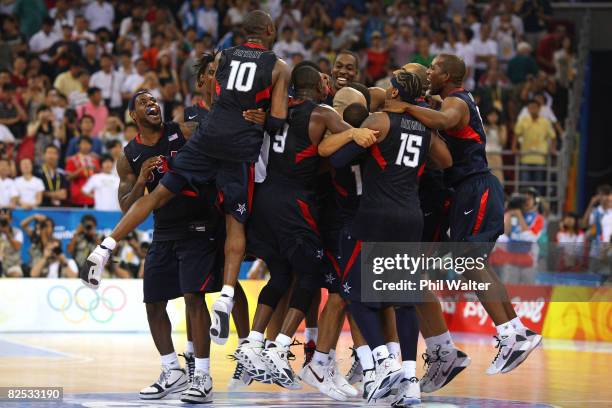 The United States team huddles at center court after defeating Spain 118-107 in the gold medal game during Day 16 of the Beijing 2008 Olympic Games...