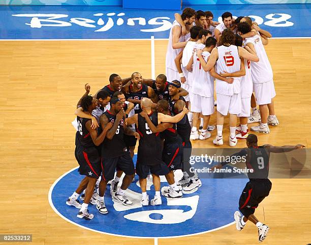 Dwyane Wade of the United States runs to join his team at center court after winning the gold medal game 118-107 over Spain during Day 16 of the...