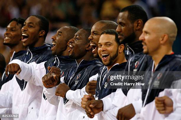 The United States team steps on to the podium to receive the gold medal after defeating Spain in the gold medal game during Day 16 of the Beijing...