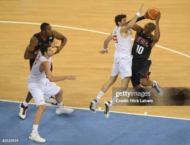 Kobe Bryant of the United States goes up for a shot over Rudy Fernandez of Spain in the gold medal game during Day 16 of the Beijing 2008 Olympic...