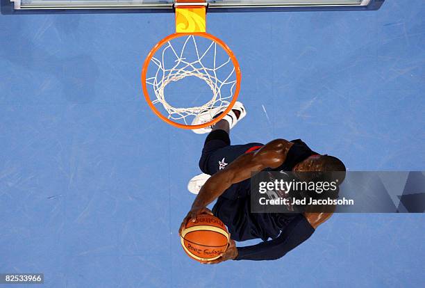 Dwyane Wade of the United States goes up for a slam dunk in the gold medal game during Day 16 of the Beijing 2008 Olympic Games at the Beijing...