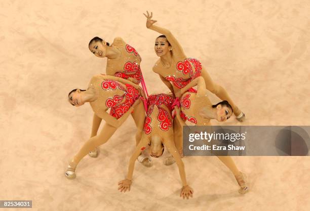 The Chinese team perform in the 5 Ropes rotation in the Group All-Around Final held at the Beijing University of Technology Gymnasium during Day 16...