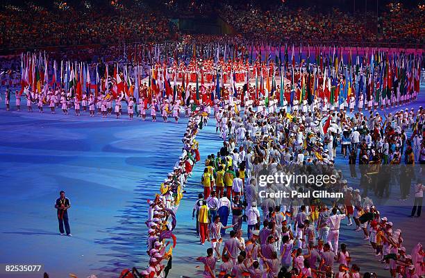 Flagbearers representing countries from around the world are seen at the National Stadium during the Closing Ceremony for the Beijing 2008 Olympic...