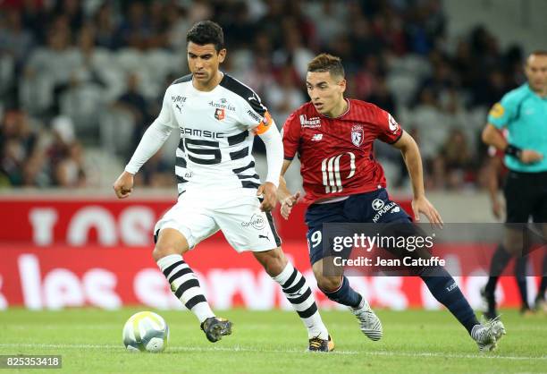 Benjamin Andre of Stade Rennais and Ezequiel Ponce of Lille during the pre-season friendly match between Lille OSC and Stade Rennais FC at Stade...