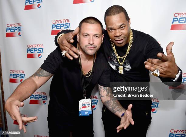 Prostyle and Busta Rhymes attend the Crystal Pepsi Throwback Tour to bring music, baseball, and iconic Clear Cola to fans at Billy's Sports Bar on...