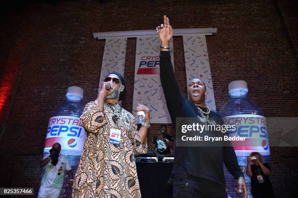 Kool Herc and Busta Rhymes attend the Crystal Pepsi Throwback Tour to bring music, baseball, and iconic Clear Cola to fans at Billy's Sports Bar on...