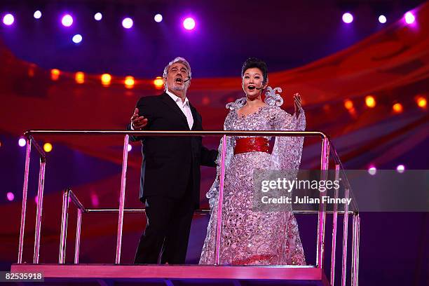 Singers Placido Domingo and Song Zuying perform during the Closing Ceremony for the Beijing 2008 Olympic Games at the National Stadium on August 24,...