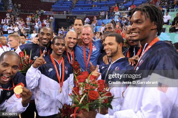 Doug Collins and the U.S. Men's Senior National Team celebrates winning the men's gold medal basketball game at the 2008 Beijing Olympic Games at the...