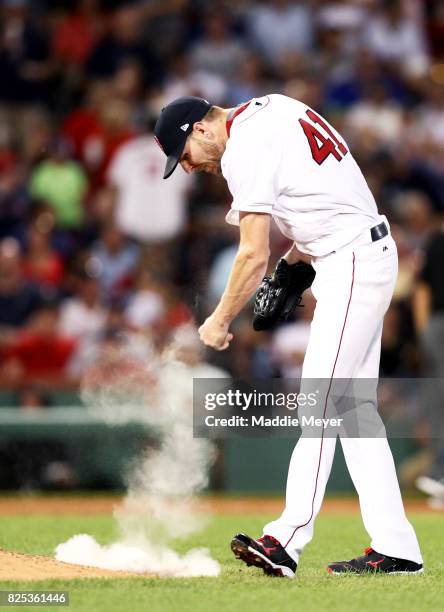 Chris Sale of the Boston Red Sox throws his rosin bag after Edwin Encarnacion of the Cleveland Indians hit a two run homer during the fifth inning at...