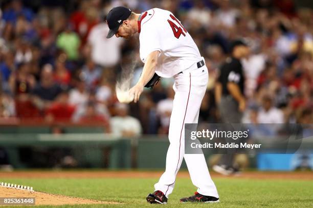 Chris Sale of the Boston Red Sox throws his rosin bag after Edwin Encarnacion of the Cleveland Indians hit a two run homer during the fifth inning at...