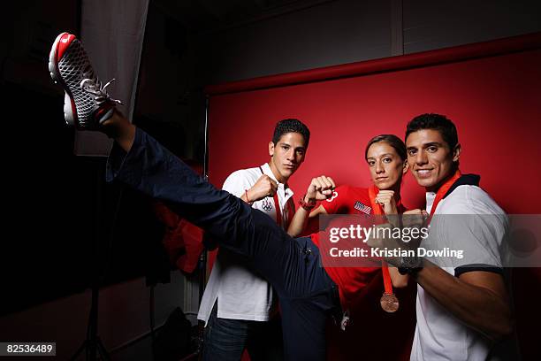 Taekwondo athletes Mark Lopez, Diana Lopez and Steven Lopez of the United States pose in the NBC Today Show Studio at the Beijing 2008 Olympic Games...