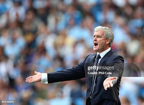 Mark Hughes, Manager of Manchester City, during the Barclays Premier League match between Manchester City and West Ham United at The City of...