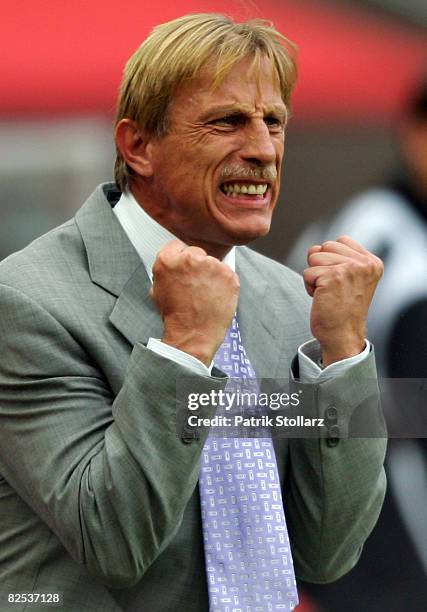 Head coach Christoph Daum of Koeln gestures during the Bundesliga match between 1.FC Koeln and Eintracht Frankfurt at the RheinEnergyStadium on...