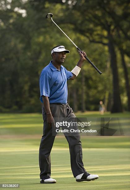 Vijay Singh of Fiji makes a birdie on the 18th hole to force a three-way playoff during the final round of The Barclays held at the Ridgewood Country...