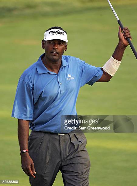 Vijay Singh of Fiji reacts to a birdie putt on the first playoff hole after the final round of The Barclays at Ridgewood Country Club on August 24,...