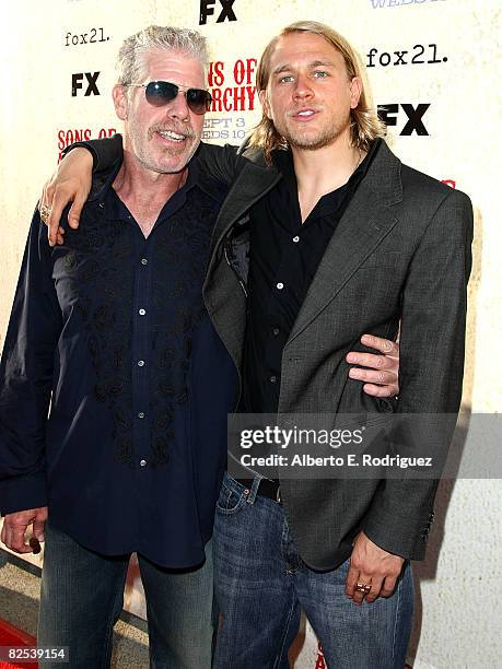 Actor Ron Perlman and actor Charlie Hunnam arrive at the series premiere screening of FX Network's "Sons of Anarchy" held at the Paramount Studios...