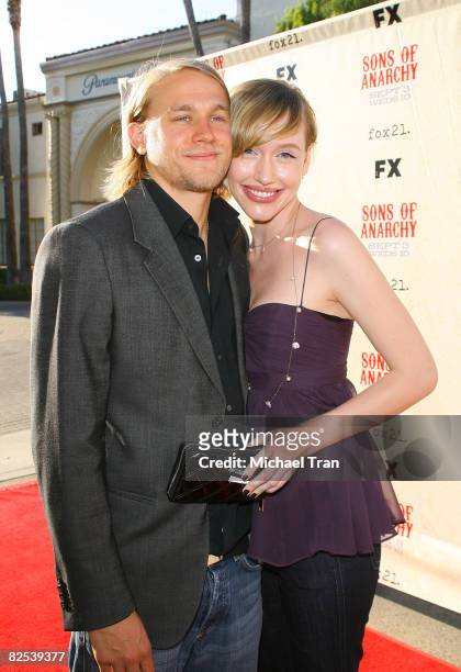 Actor Charlie Hunnam and girlfriend Morgana arrive at the FX Series Screening of "Sons of Anarchy" held at Paramount Theater at Paramount Studios on...