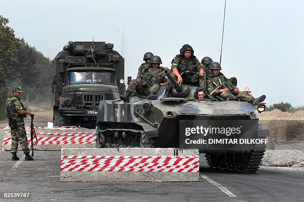 Russian armoured vehicle passing at a checkpoint on the Gori-Tbilisi road near the village of Khurvaleti on August 22, 2008. If Russia recognises...