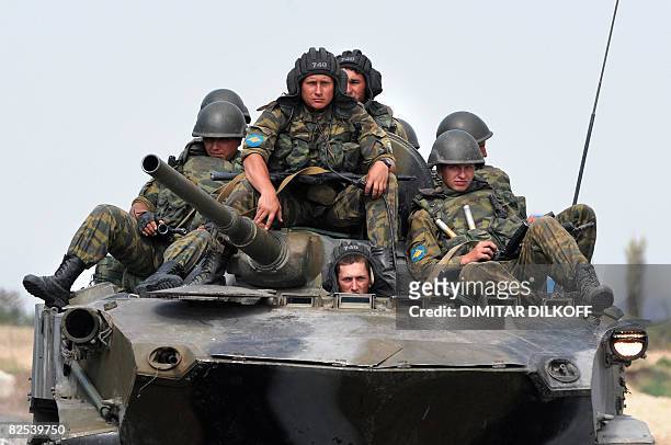 Russian armoured vehicle passes a checkpoint on the Gori-Tbilisi road near the village of Khurvaleti on August 22, 2008. If Russia recognises...