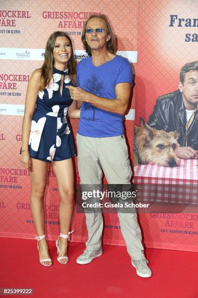 Eisi Gulp and his daughter Aliyah during the 'Griessnockerlaffaere' premiere at Mathaeser Filmpalast on August 1, 2017 in Munich, Germany.