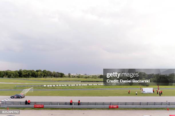 Sebastain Giovinco of Toronto FC and Nemanja Nikolic of Chicago Fire take part in a goal kick challenge as Audi hits the track with Major League...