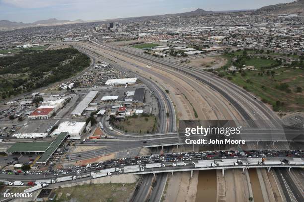 An international bridge crosses the Rio Grande which forms the U.S.-Mexico border as seen from a U.S. Customs and Border Protection helicopter on...