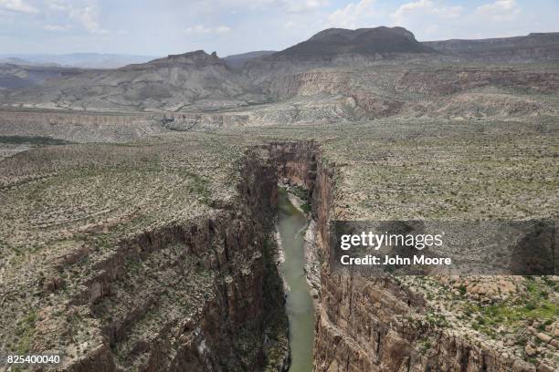 The Rio Grande forms the U.S.-Mexico border while winding through the Santa Elena Canyon in the Big Bend region on August 1, 2017 as seen from a U.S....