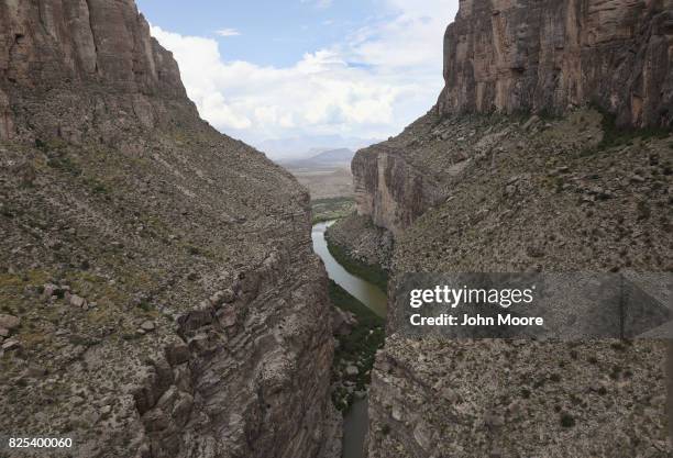 The Rio Grande forms the U.S.-Mexico border while winding through the Santa Elena Pass in the Big Bend region on August 1, 2017 near Lajitas, Texas....