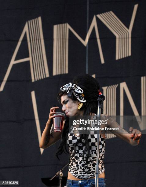 Amy Winehouse performs on day one of the V Festival at Weston Park on August 16, 2008 in Telford, England.