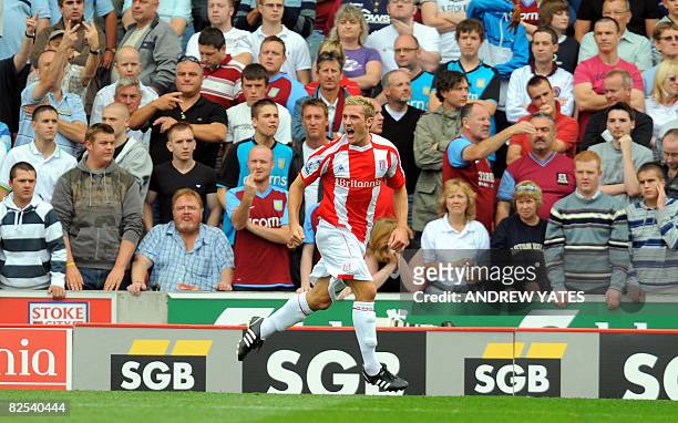 Stoke City's Liam Lawrence celebrates after scoring a penalty during the Premier league football match against Aston Villa at The Britannia Stadium...