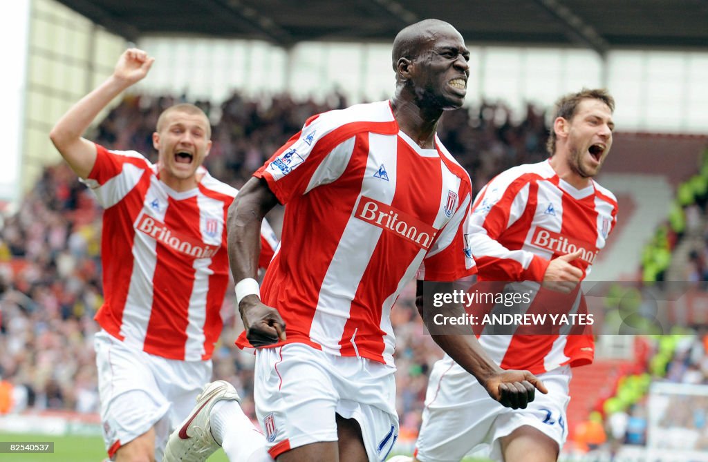 Stoke City's Mamady Sidibe (C) celebrate