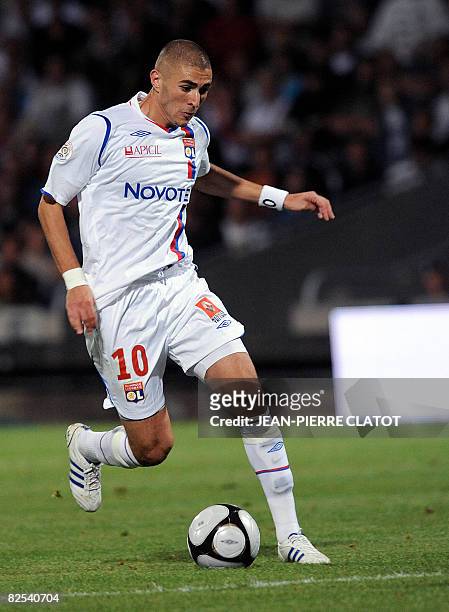 Lyon's Karim Benzema dribbles the ball during the French L1 football match Lyon vs. Grenoble on August 23, 2008 at the Gerland stadium in Lyon,...