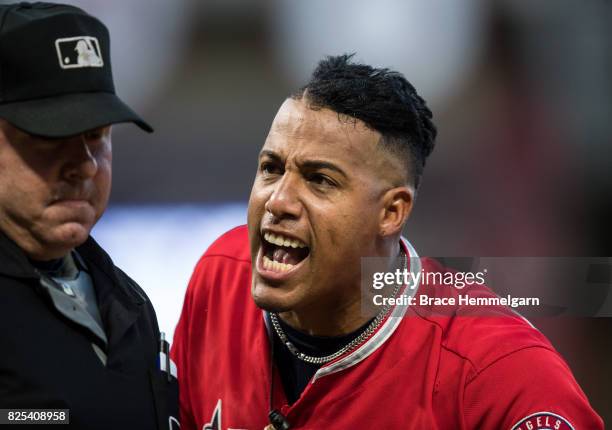 Yunel Escobar of the Los Angeles Angels of Anaheim argues a call and is ejected against the Minnesota Twins on July 5, 2017 at Target Field in...