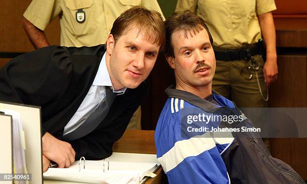 Defendant Sven Kittelmann and his lawyer Maximilian Pauls wait for his trial for armed robbery on August 25, 2008 in Munich, Germany. Kittelmann, a...