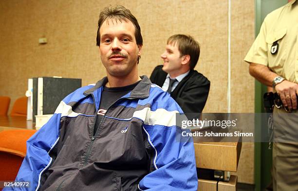 Defendant Sven Kittelmann and his lawyer Maximilian Pauls wait for his trial for armed robbery on August 25, 2008 in Munich, Germany. Kittelmann, a...