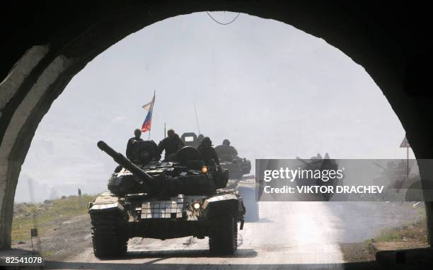 Russian tanks move towards the town of Alagir some 40 km outside Vladikavkaz as they leave South Ossetia on August 24, 2008. The West on Sunday...
