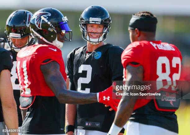 Atlanta Falcons quarterback Matt Ryan , wide receiver Julio Jones and tight end Josh Perkins speak on August 01, 2017 during the Atlanta Falcons...