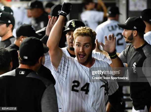 Chicago White Sox third baseman Matt Davidson celebrates in the dugout after hitting the ball for a home run during the game between the Toronto Blue...