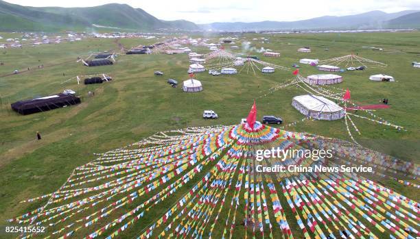 Tents are erected for a tent festival on a grassland 4,500 meters above sea level on August 1, 2017 in Shiqu County, , Sichuan Province of China.