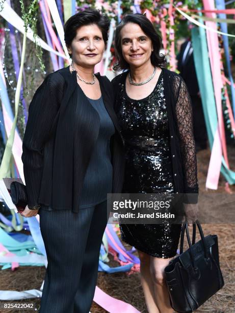 Cecile Panzieri and Janine Cirincione attend The 24th Annual Watermill Center Summer Benefit & Auction at The Watermill Center on July 29, 2017 in...