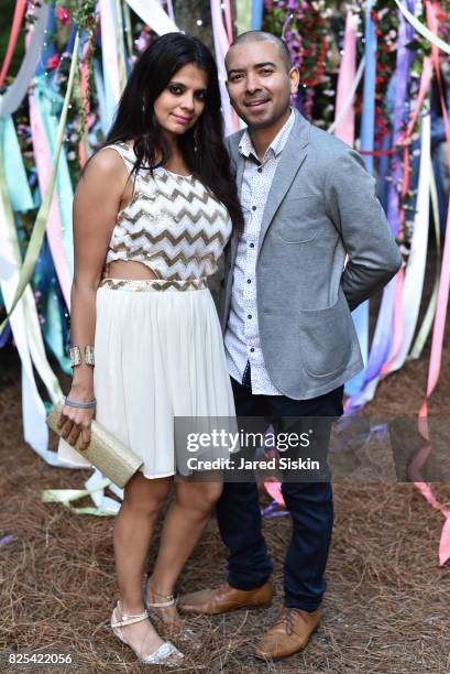 Ambika Kataria and Steve Rivera attend The 24th Annual Watermill Center Summer Benefit & Auction at The Watermill Center on July 29, 2017 in Water...